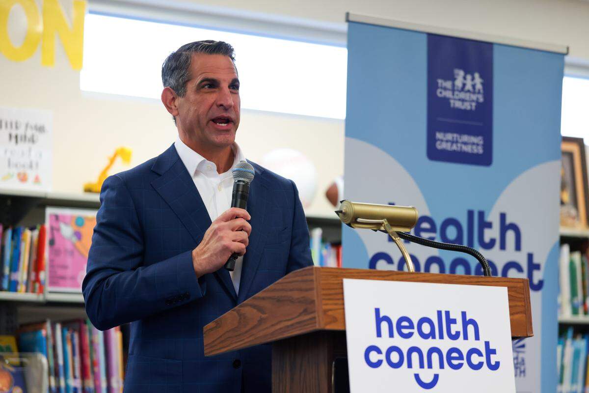 James R. Haj, president and CEO of The Children’s Trust, announces an expansion of HealthConnect, which provides free vision, dental and medical care at 283 Miami-Dade public schools.  He’s speaking during a press conference at Spanish Lake Elementary School in Hialeah, Florida, Tuesday, Jan. 13, 2026. 