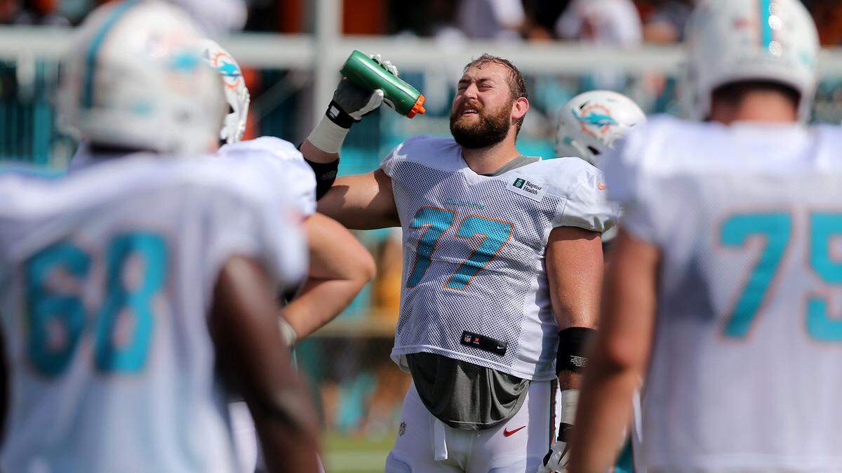 Dolphins offensive lineman Jesse Davis signed a three-year, $15 million contract extension