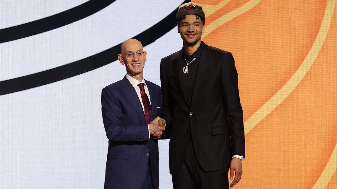 Kel’el Ware poses for photos with NBA commissioner Adam Silver after being selected in the first round by the Miami Heat in the 2024 NBA Draft at Barclays Center.