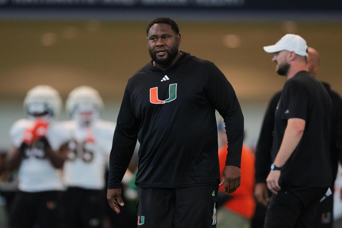 Miami Hurricanes defensive tackles coach Damione Lewis looks on during spring practice at the Carol Soffer Indoor Practice Facility at the University of Miami in Coral Gables, Florida, Thursday, March 20, 2025.