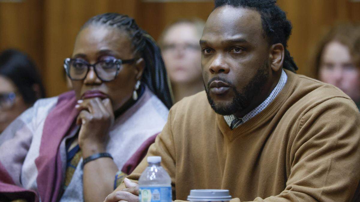 Rashaun Jones, who is accused of killing his University of Miami football teammate Bryan Pata in 2006, listens to opening statements with attorney Bonita E Jones Peabody during opening statements in Judge Cristina Miranda’s Courtroom 4-1 at the Richard E. Gerstein Justice Building in Miami on Wednesday, February 18, 2026.