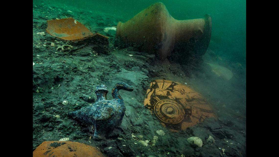 Among the discoveries was a duck-shaped bronze jug, according to officials in Egypt.