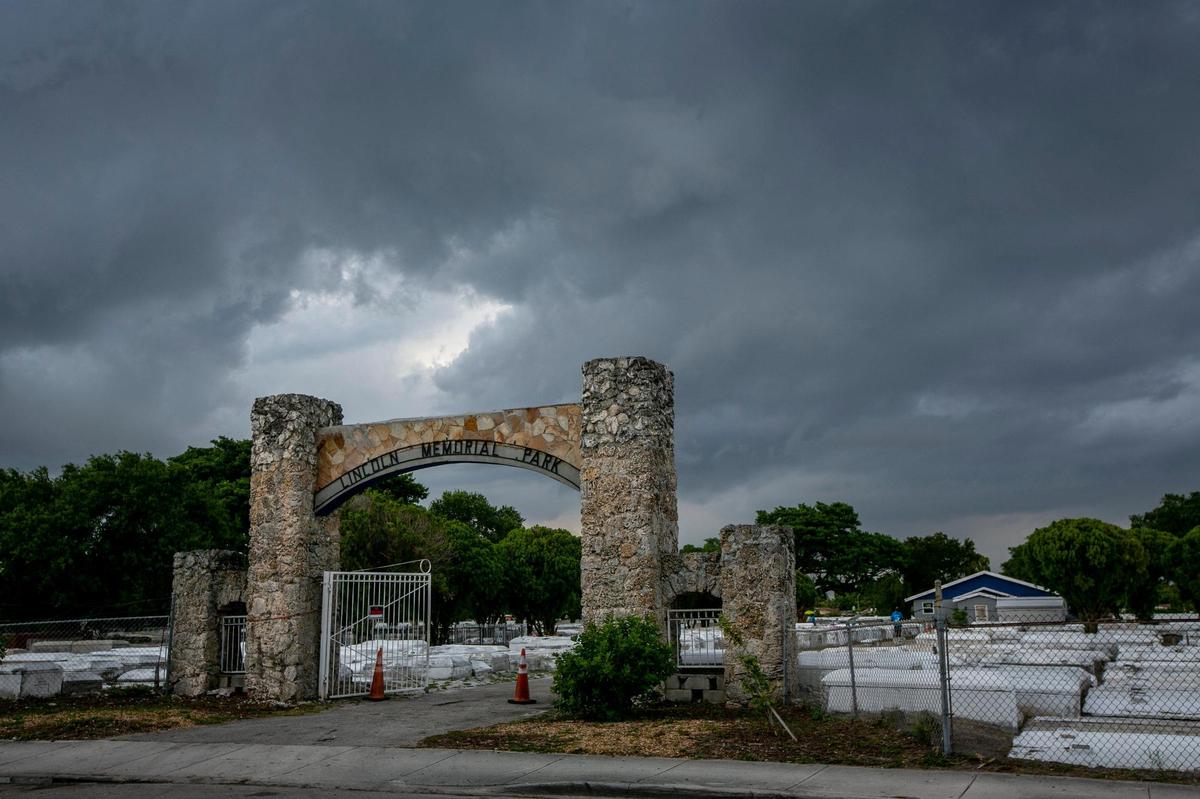 Miami, Florida, May 7 2021 - The entrance to Lincoln Memorial Cemetery, 3001 NW 46th St., Miami, on a stormy evening in May.