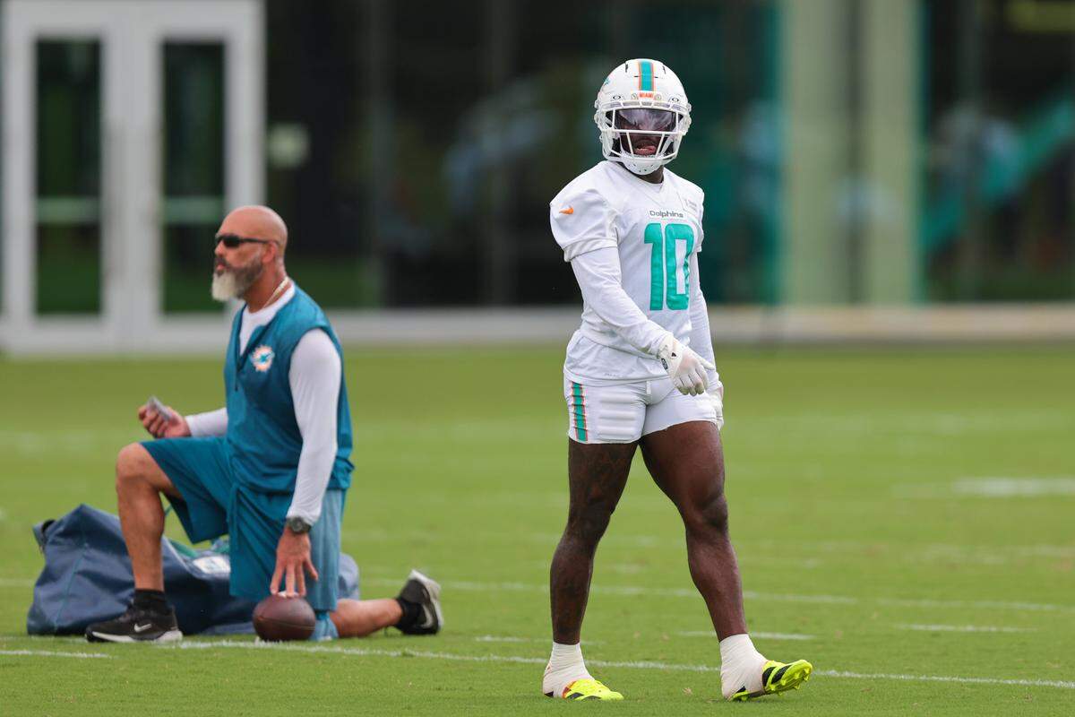 Miami Dolphins wide receiver Tyreek Hill (10) walks on the field during practice at Baptist Health Training Complex in Miami Gardens, Florida, Thursday, September 4, 2025.