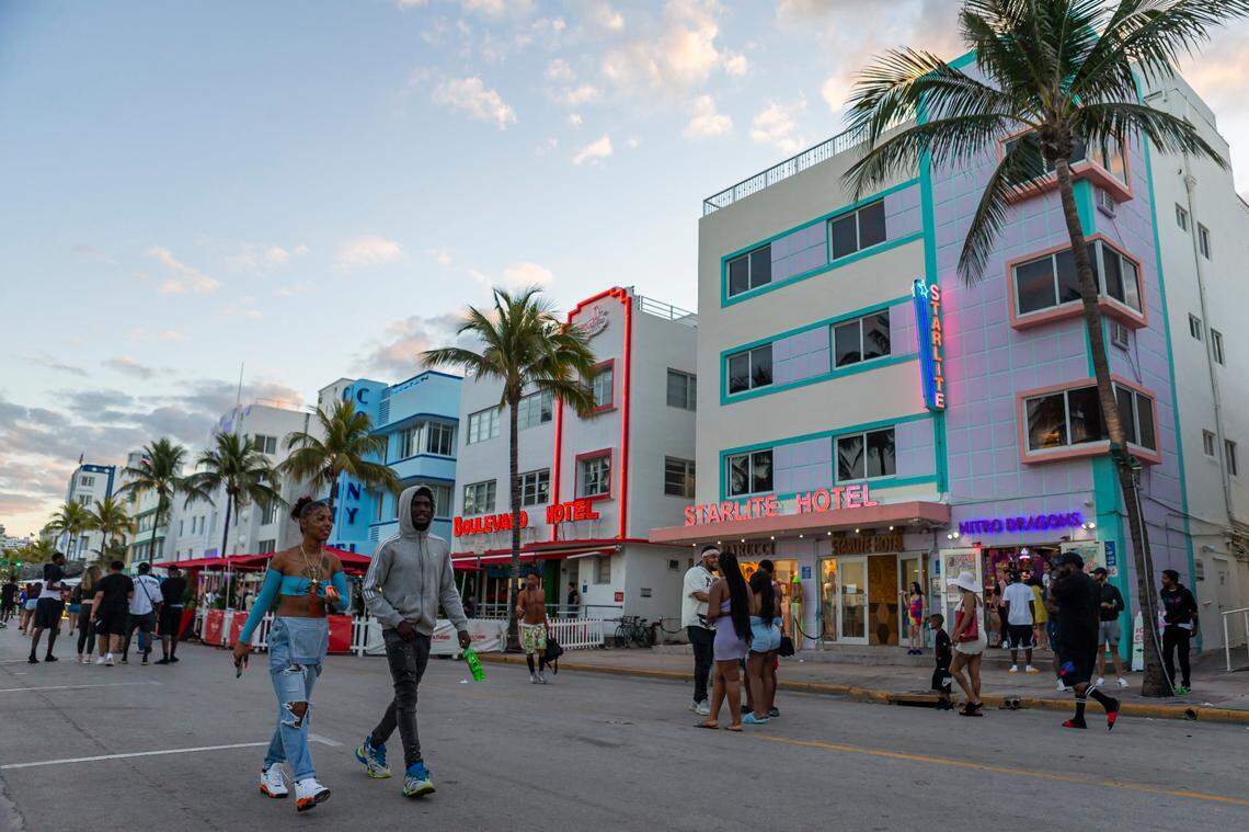 Tourists make their way down Ocean Drive during spring break in Miami Beach on Monday, March 22, 2021.