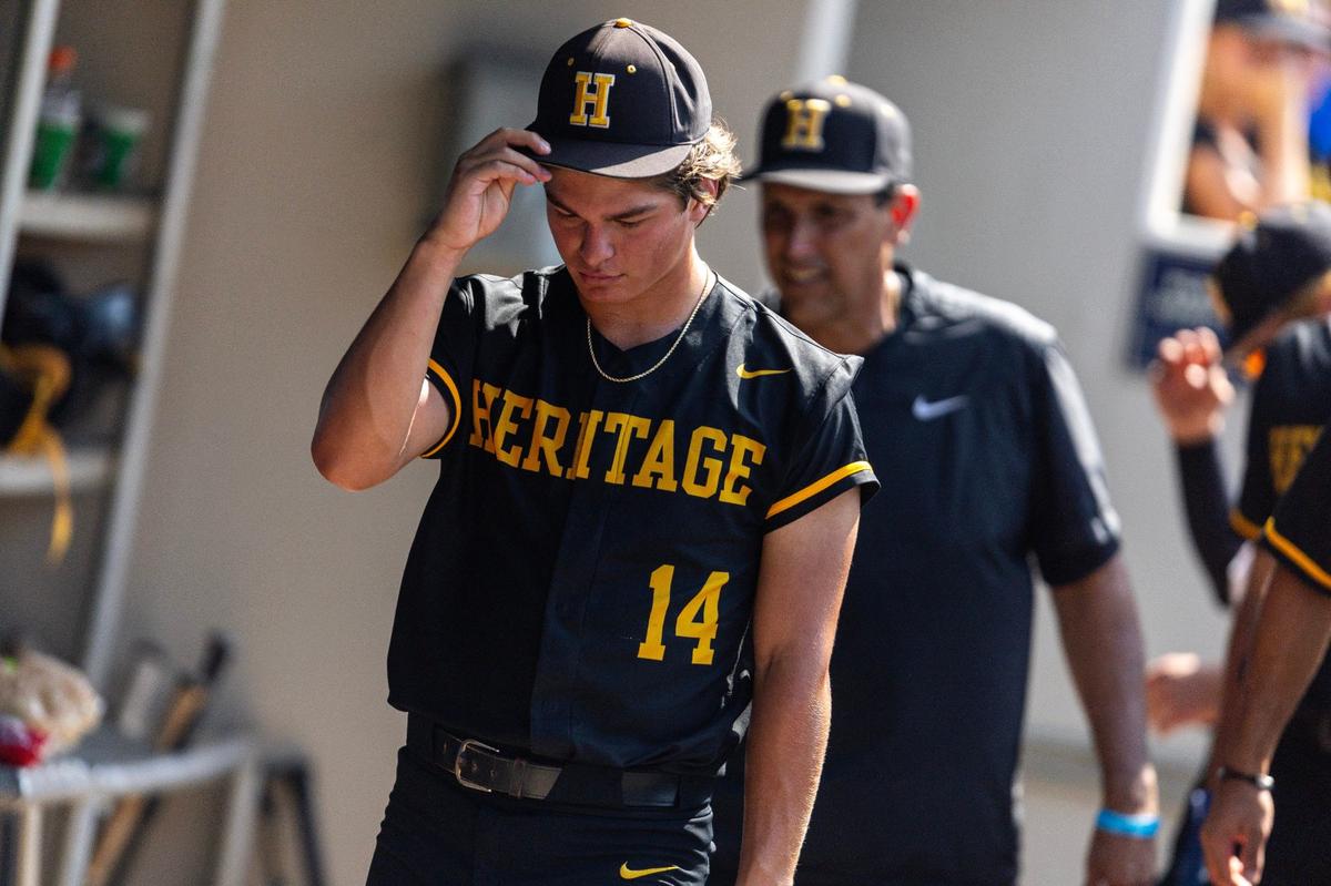 American Heritage pitcher Talan Holiday (14) reacts after losing 5-2 to the Jesuit Tigers during the Class 5A state baseball championship game at Hammond Stadium on Saturday, May 18, 2024, in Fort Myers, Fla.