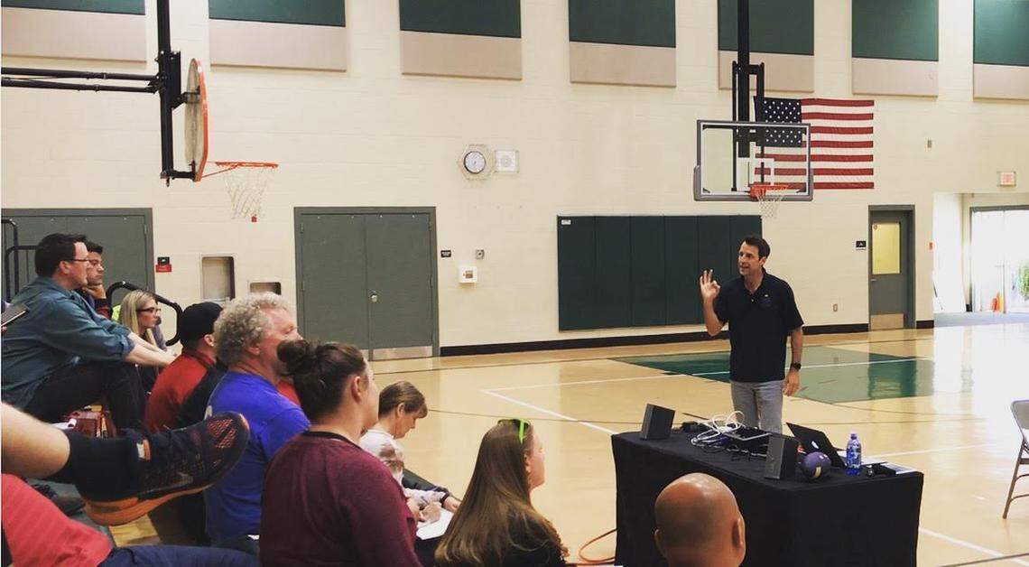 Cletus Coffey, a former professional football player, runs a workshop at a youth soccer clinic in Seattle. Coffey works with the Positive Coaching Alliance to teach students, parents and coaches about the importance of mental health.