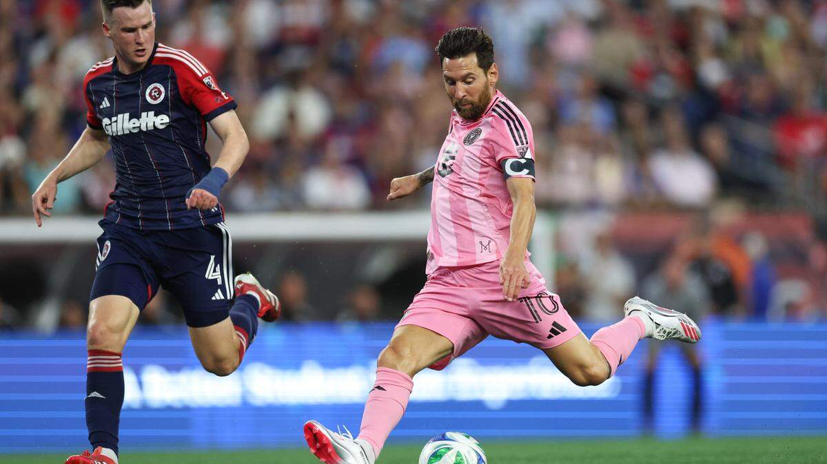 Jul 9, 2025; Foxborough, Massachusetts, USA; Inter Miami CF forward Lionel Messi (10) scores a goal during the first half against the New England Revolution at Gillette Stadium. He has scored 14 goals in 15 MLS games this season.