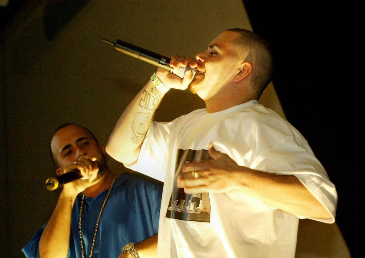 In 2004, Pitbull performs at a Miami awards show at Players nightclub.