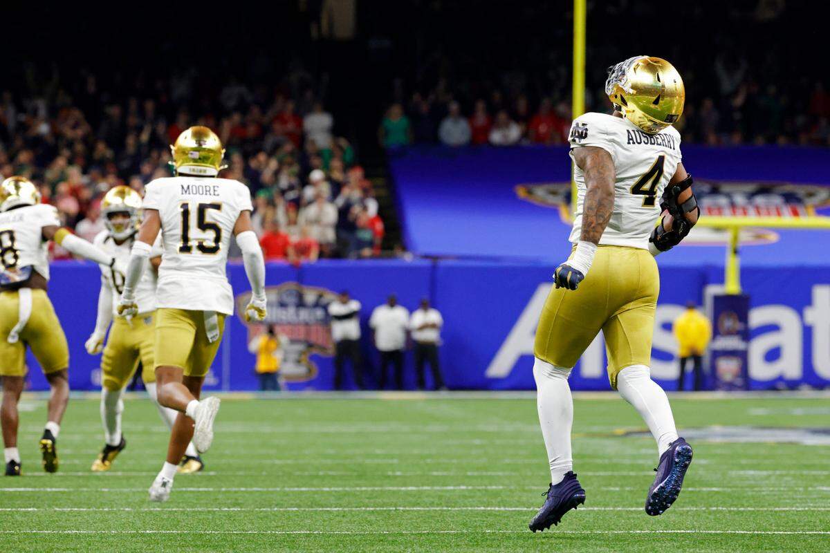 Jan 2, 2025; New Orleans, LA, USA; Notre Dame Fighting Irish linebacker Jaiden Ausberry (4) celebrates after recovering a fumble during the first quarter after the game during the first half at Caesars Superdome. Mandatory Credit: Amber Searls-Imagn Images