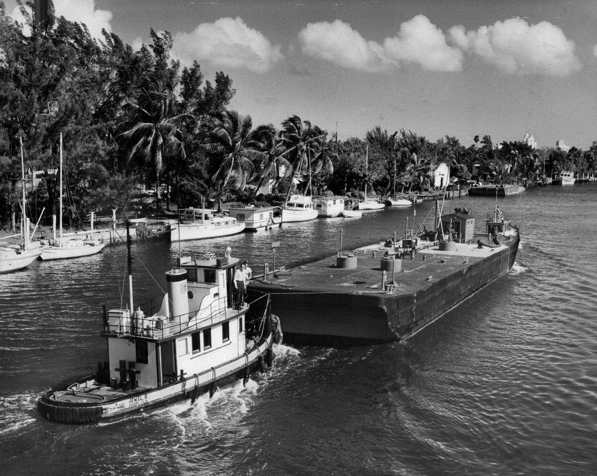 An oil barge navigates the Miami River in 1959.