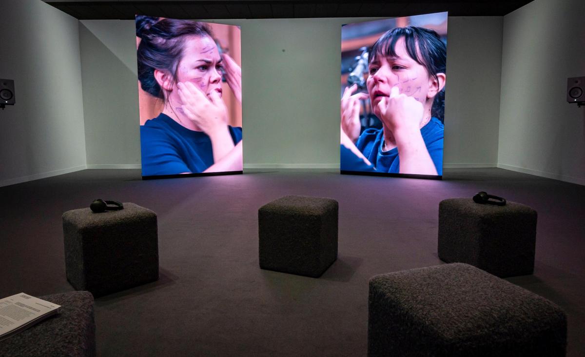 Miami Beach, Florida, December 6, 2023 - A video installation titled Composition for Face and Hands by Oliver Beer at Meridians during Art Basel VIP day at the Miami Beach Convention Center.