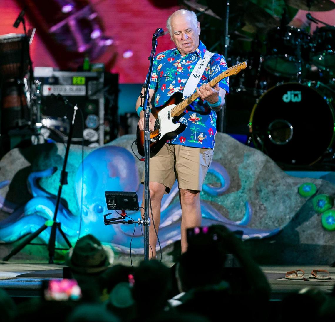 Jimmy Buffett and his Coral Reefer Band perform during their concert at the iTHINK Financial Amphitheatre in West Palm Beach, Florida on Thursday, Dec. 9, 2021.