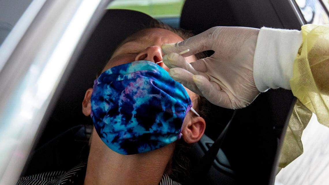 Brenda gets tested via nasal swab for the novel coronavirus at the Xera Med Research COVID-19 molecular/PCR testing site at it’s new Wynwood drive-thru location behind the Mana Convention Center in Miami, Florida on Monday, August 24, 2020.