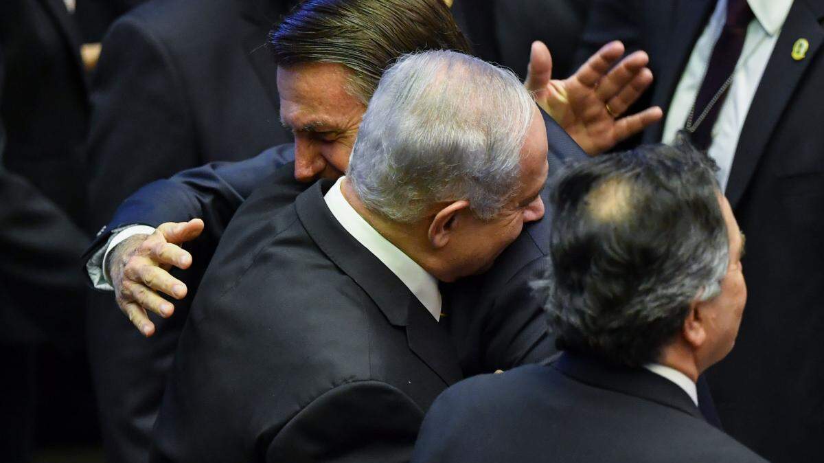 In January, Brazil’s President Jair Bolsonaro greets Israel’s Prime Minister Benjamin Netanyahu , left, in Brasilia.