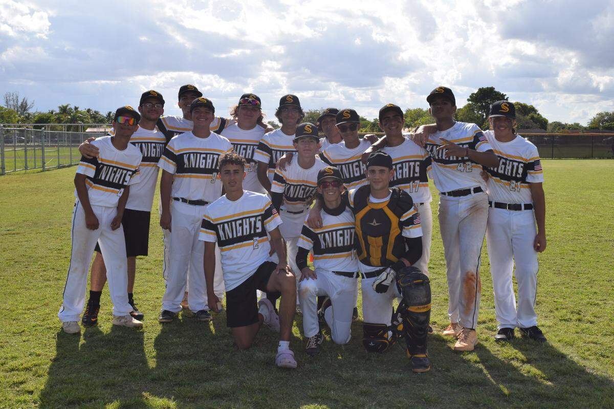 The entire team – including coaches, parents and other supporters of the program – rejoiced after Sunset’s 17-0 win over Westland Hialeah.
