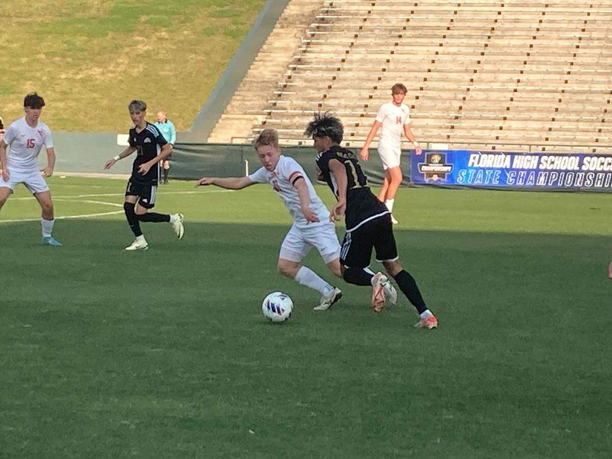 South Broward’s Lucas Costa drives past a Valrico Bloomingdale defender during Wednesday’s Class 6A state semifinal at Spec Martin Stadium in DeLand.
