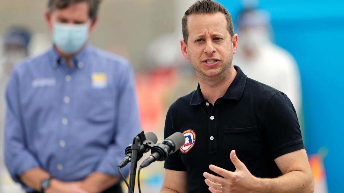 Division of Emergency Management Director Jared Moskowitz talks to the media alongside Florida Gov. Ron DeSantis at a press conference to announce COVID-19 antibody testing and a mobile lab at Hard Rock Stadium in Miami Gardens on Wednesday, May 6, 2020.