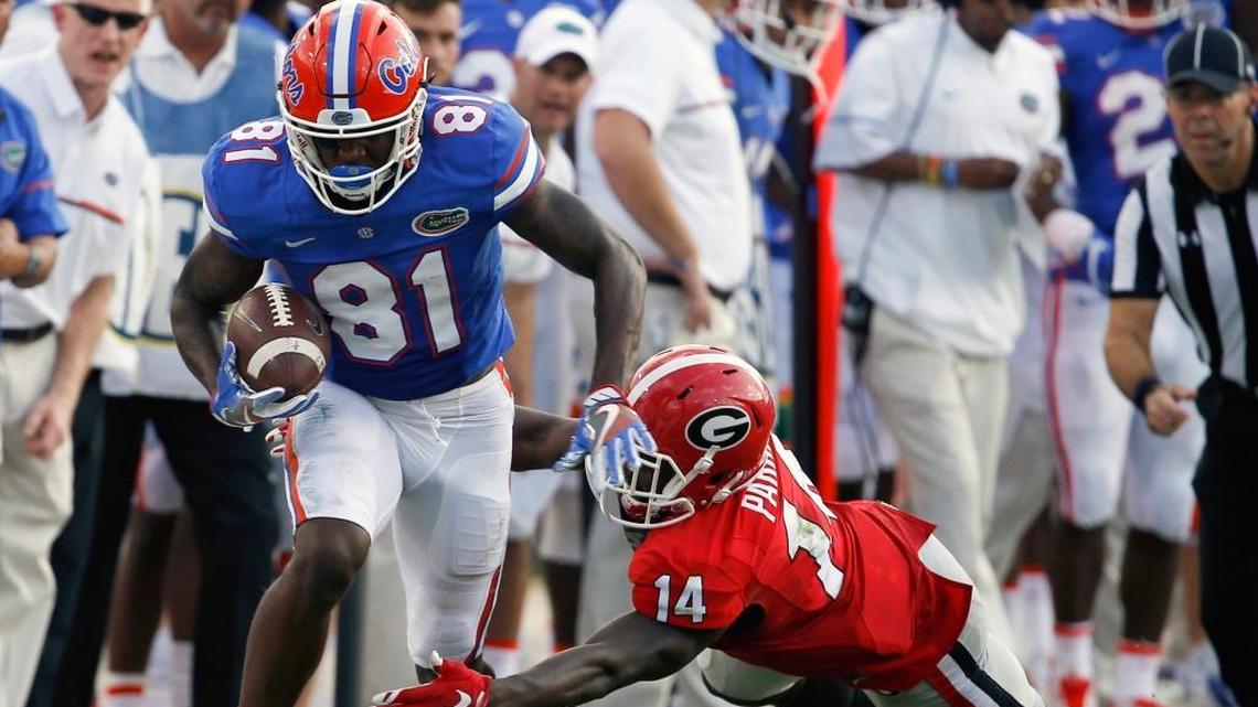 Florida wide receiver Antonio Callaway (81) runs against Georgia cornerback Malkom Parrish (14) during the first half of an NCAA college football game, Saturday, Oct. 29, 2016, in Jacksonville, Fla.