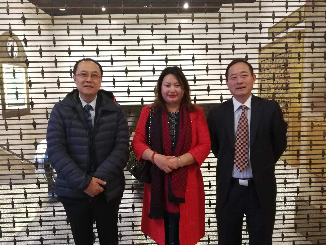 Cindy Yang, center, brought tech executive Lucas Lu, left, to a Dec. 2, 2017, fundraiser for President Donald Trump as a guest of the National Committee for Asian-American Republicans. Cliff Li, right, is the group’s executive director.