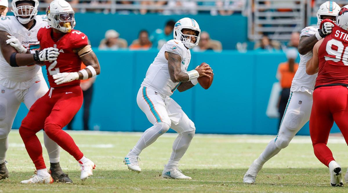 Miami Dolphins quarterback Tua Tagovailoa (1) ssets up to pass in the game against the Arizona Cardinals in the first half during an NFL football game at Hard Rock Stadium in Miami Gardens, Florida on Sunday, October 27, 2024.