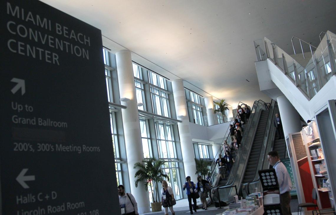 Attendees at a health management convention make their way through the newly renovated lobby area of the Miami Beach Convention Center on Tuesday, Sept. 25, 2018, in Miami Beach.
