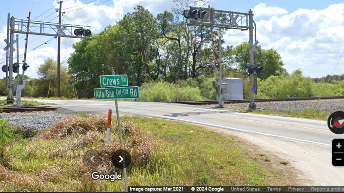 Dispatchers with Polk County 911 traced the 1 a.m. call to this rural intersection near Lake Wales, Florida, officials said.