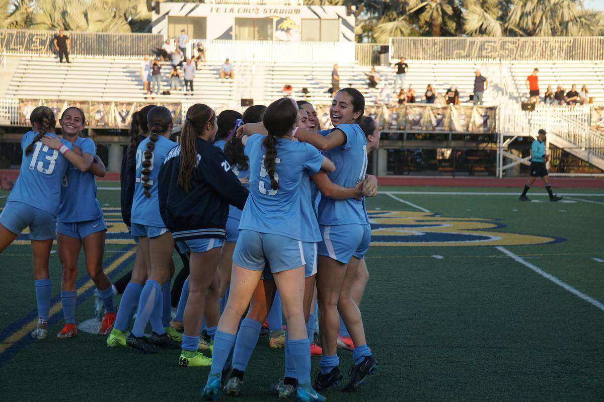 Lourdes soccer team celebrates during its 6-0 win over Stuart South Fork on Friday in a Region 4-5A semifinal at Belen Jesuit.