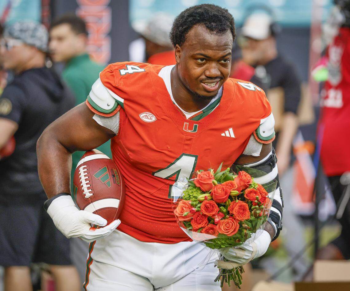 Miami Hurricanes defensive lineman Rueben Bain Jr. (4) during Senior Day ceremony before the start of the NCAA game against the NC State Wolfpack at Hard Rock Stadium in Miami Gardens, Florida, on Saturday, November 15, 2025.