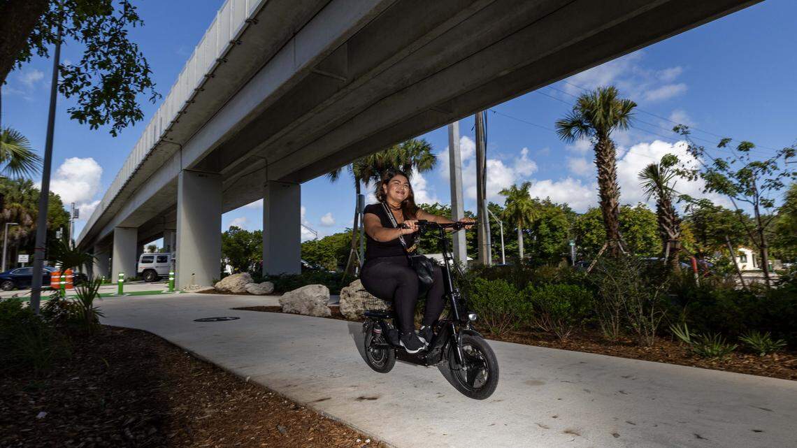 A bicyclist pedals down Phase 3 of the The Underline on Tuesday, August 12, 2025, in Miami, Fla.