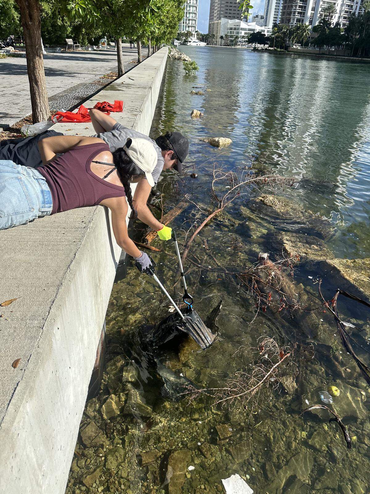 Volunteers work on picking up trash for Miami Cleanup 2025.