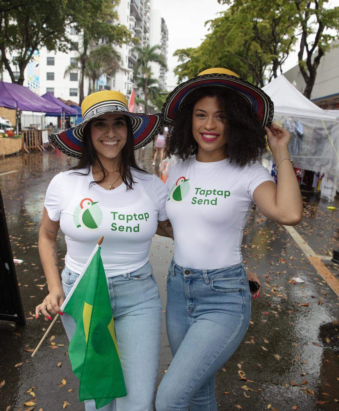 Stephany Dantas (left) and Andressa Carvalho of Tap Tan pose for the picture during Calle Ocho festival on Sunday, March 15, 2026 in Little Havana. Andrew Uloza / for Miami Herald