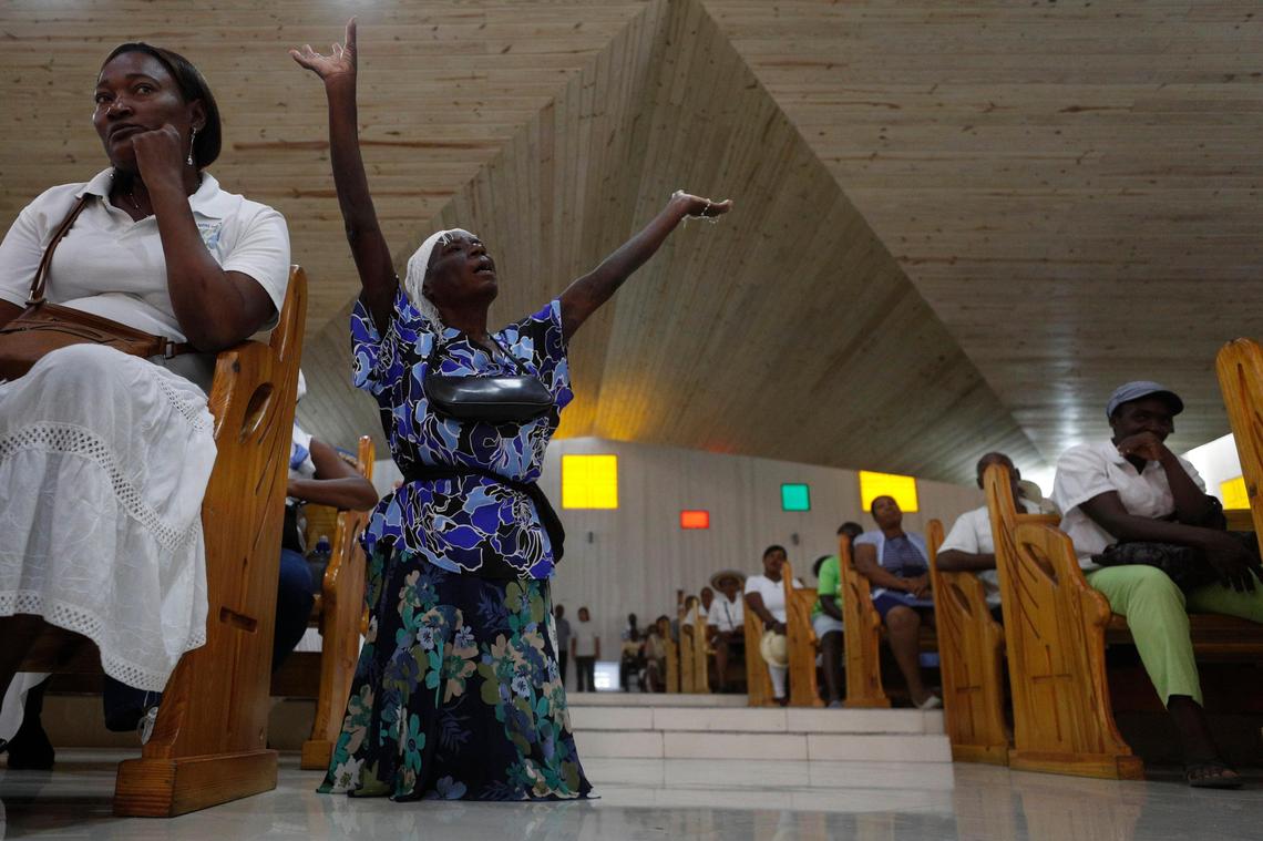 Catholic faithful participate in prayers for Haiti at Christ the King Church ahead of a march called by religious leaders in Port-au-Prince, Haiti, Tuesday, Oct. 22, 2019.