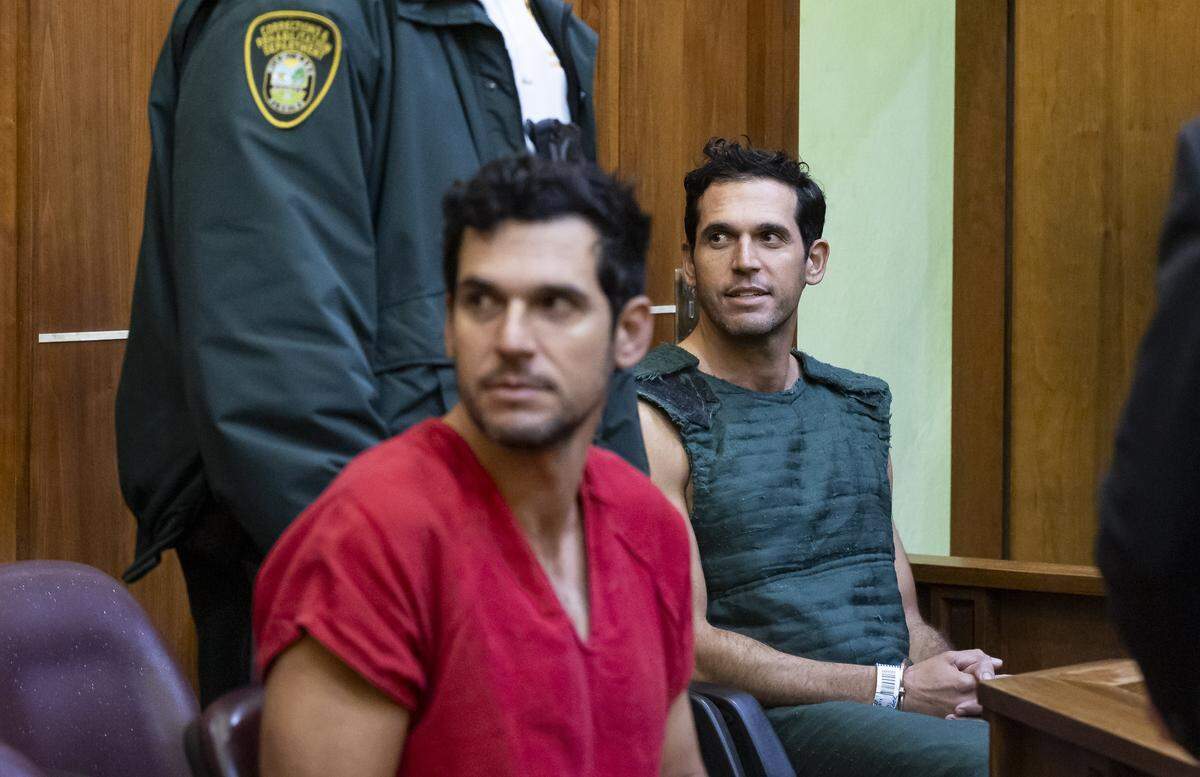 Oren Alexander, left, and his twin brother, Alon, right, attend their bond hearing at the Richard E. Gerstein Justice Building on Friday, Dec. 13, 2024, in Miami, Fla. 