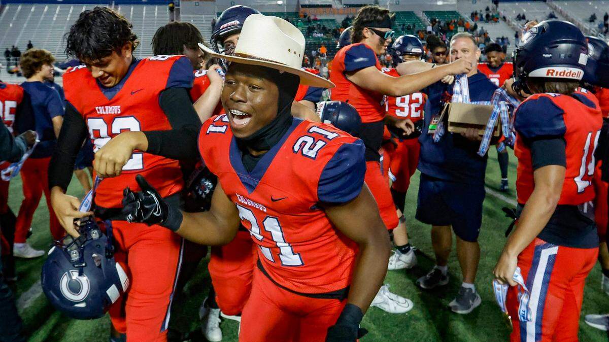 Columbus Explorers running back Agyeman Addae (21) celebrates the win against the Mandarin Mustangs in the FHSAA State Championships, Class 4M, at Bragg Memorial Stadium in Tallahassee, Florida, on Friday, December 8, 2023.