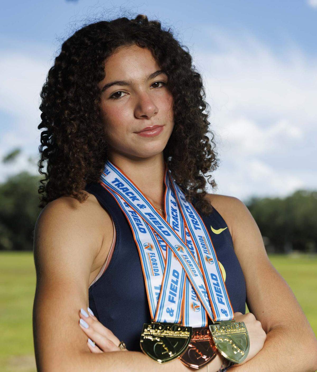 Arianna Garcia, track runner at Carrollton School of the Sacred Heart, poses during the Miami Herald's player of the year photoshoot on Wednesday, May 20, 2026, at AD Barnes Park in Miami, Fla.