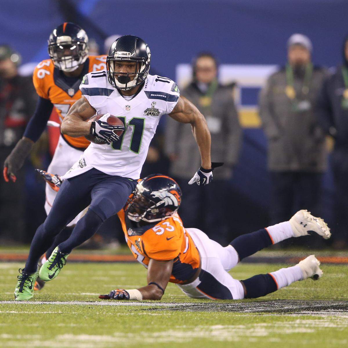 Percy Harvin (11) of the Seattle Seahawks returns the opening kick of the second half for a touchdown against the Denver Broncos during Super Bowl XLVIII at MetLife Stadium in East Rutherford, N.J., on Sunday, Feb. 2, 2014. (Lionel Hahn/Abaca Press/MCT)