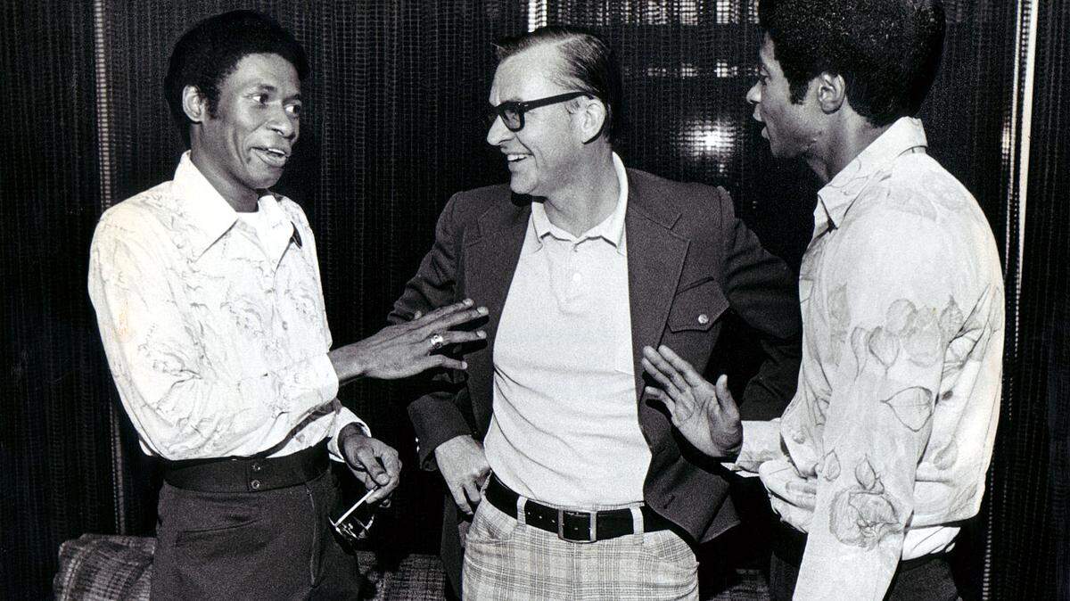 Gene Miller, center, with Freddie Pitts, left and Wilbert Lee, right, who were Death Row inmates when Miller, a reporter with the Miami Herald, helped free them in 1975. This won Miller his second Pulitzer Prize in 1976.