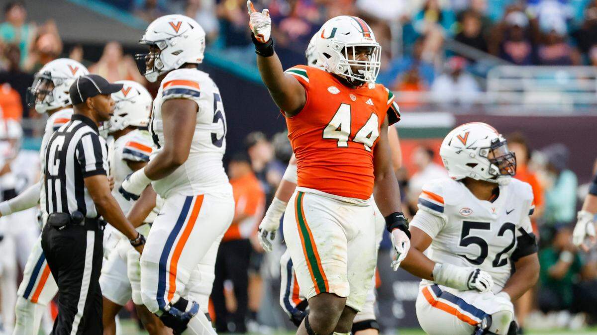 Miami Hurricanes defensive lineman Rueben Bain Jr. (44 reacts after sacking Virginia Cavaliers quarterback Tony Muskett (11) in the second half at Hard Rock Stadium in Miami Gardens on Saturday, October 28, 2023.