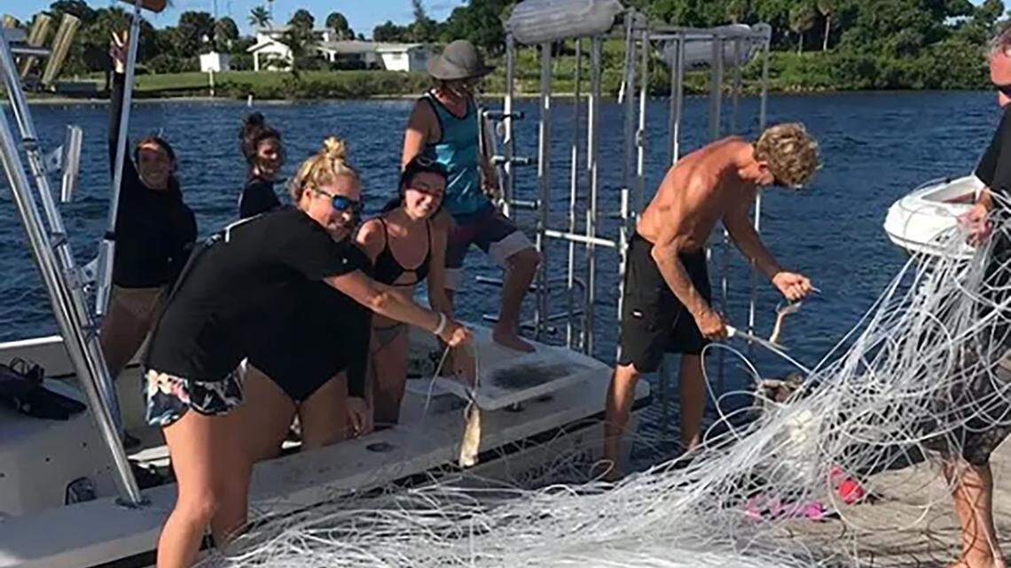 A photo of captain John Moore Jr. and passengers unloading miles of longline onto a dock in Jupiter went viral on Aug. 10, 2020. Federal prosecutors in the Southern District of Florida would use this photo, and others, to prosecute Moore and his crewmate, Tanner Mansell, for theft of fishing equipment in federal waters. President Trump pardoned their convictions on Wednesday, May 28, 2025.
