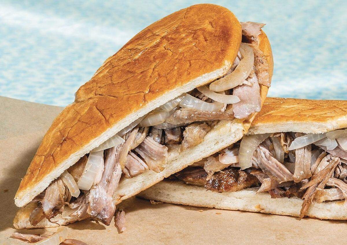 Pan con Lechón (Mojo Roast Pork) at Pollo Tropical. The Miami-based fast food chain recently launched a new line of pressed sandwiches.