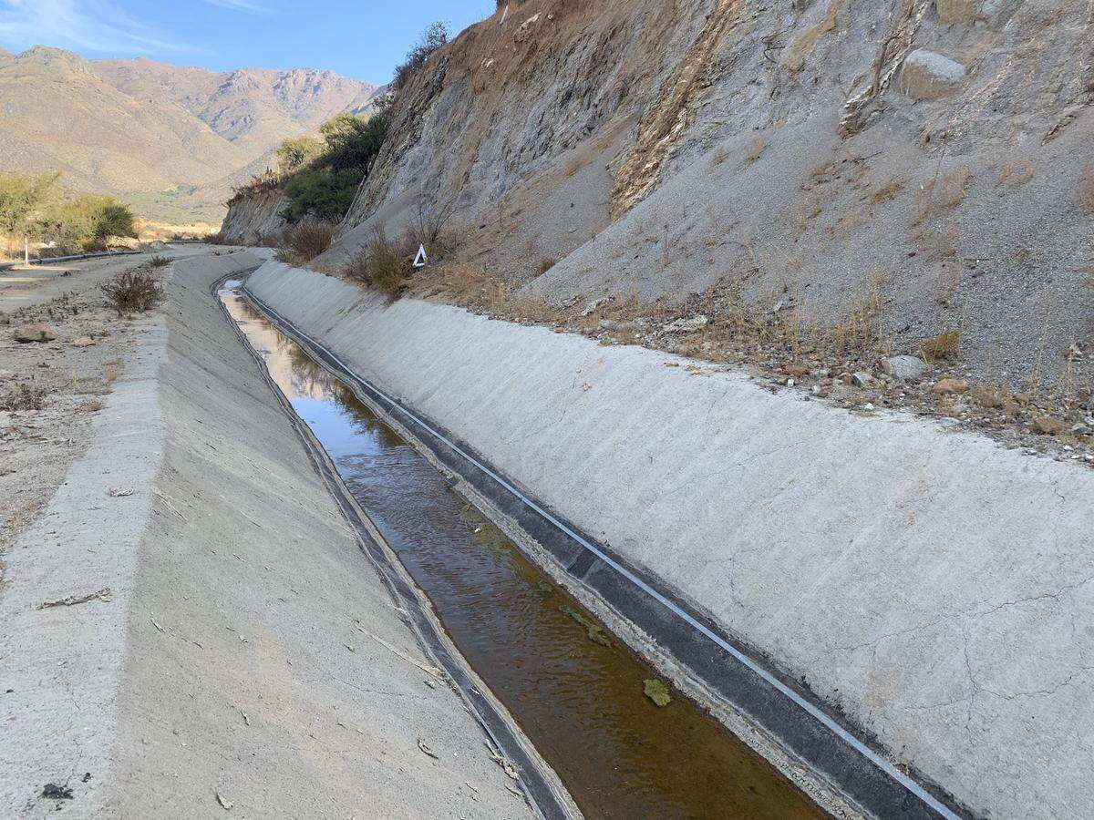 The channel built by Minera Los Pelambres to redirect water from the Pupio creek. Residents claim the flow of the water has been drastically reduced as a result.