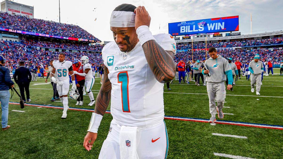 Miami Dolphins quarterback Tua Tagovailoa (1) walks off the field after the Buffalo Bills win during their NFL game at Highmark Stadium in Orchard Park, New York on Sunday, November 3, 2024.