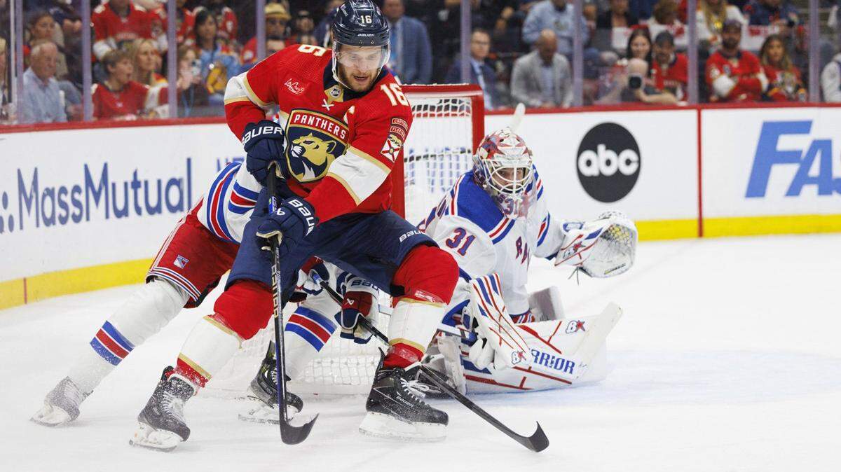 Florida Panthers center Aleksander Barkov (16) tries to take a shot on New York Rangers goaltender Igor Shesterkin (31) during the first period of Game 3 of the Eastern Conference finals of the NHL hockey Stanley Cup playoffs at the Amerant Bank Arena on Sunday, May 26, 2024, in Sunrise, Fla.