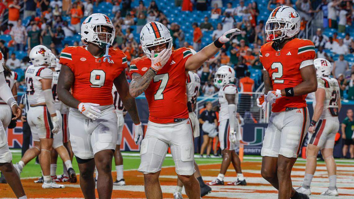 Miami Hurricanes wide receiver Xavier Restrepo (7) celebrates in the end zone with teammates after scoring in the first half of an NCAA football game against the Ball State Cardinals at Hard Rock Stadium in Miami Gardens, Florida on Saturday, September 14, 2024.