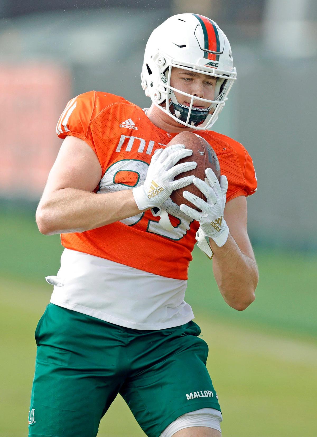 Miami Hurricanes tight end Will Mallory (85) catches the ball during practice drills at the University of Miami’s Greentree Field in Coral Gables on Thursday, March 5, 2020.