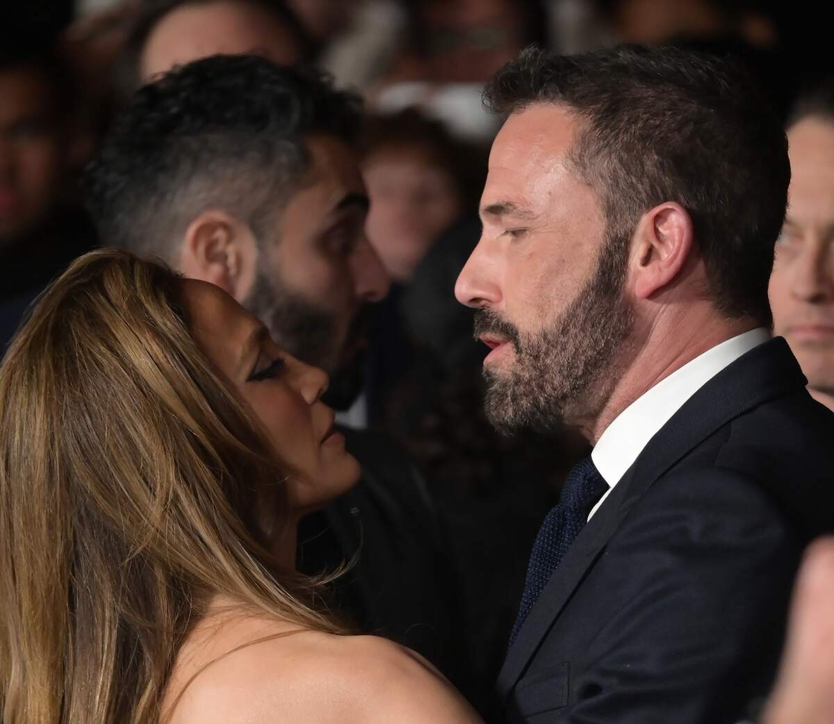 Jennifer Lopez and Ben Affleck talking with each other.