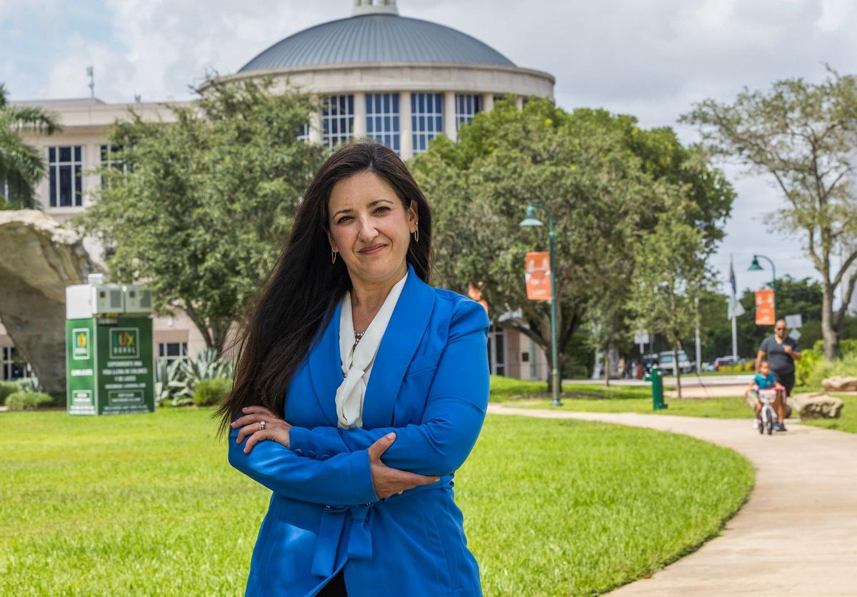 Ivette Gonzalez Petkovich, who is challenging incumbent Councilman Rafael Pineyro for Seat 1 on the Doral City Council, poses in front of Doral City Hall on Thursday, September 5, 2024.