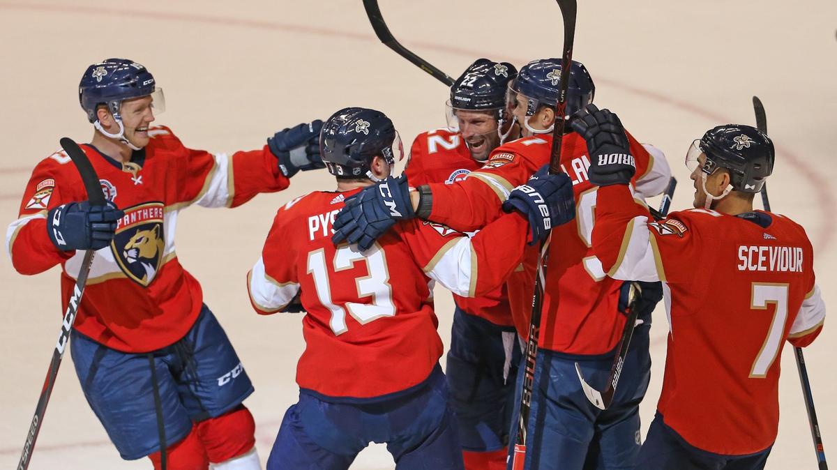 Florida Panthers right wing Troy Brouwer (22) celebrate with teammates after scoring the third goal of his team during the second period of an NHL regular season hockey game against the Columbus Blue Jackets at the BB&T Center on Thursday, October 11, 2018 in Sunrise.