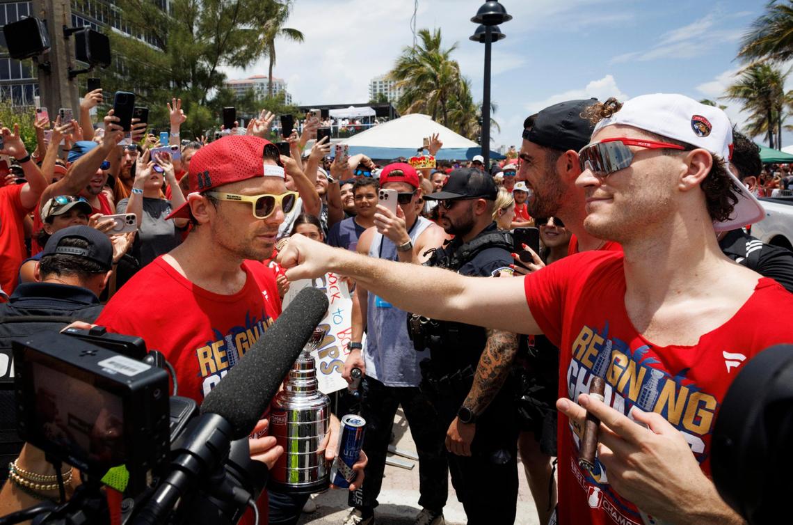 Florida Panthers center Sam Reinhart kisses Matthew Tkachuk’s ring during the Florida Panthers Stanley Cup Championship victory parade on Sunday, June 22, 2025 down Las Olas in Fort Lauderdale, Fla.